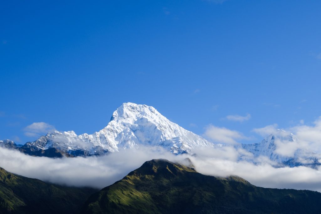 A view of a snow covered mountain

Description automatically generated