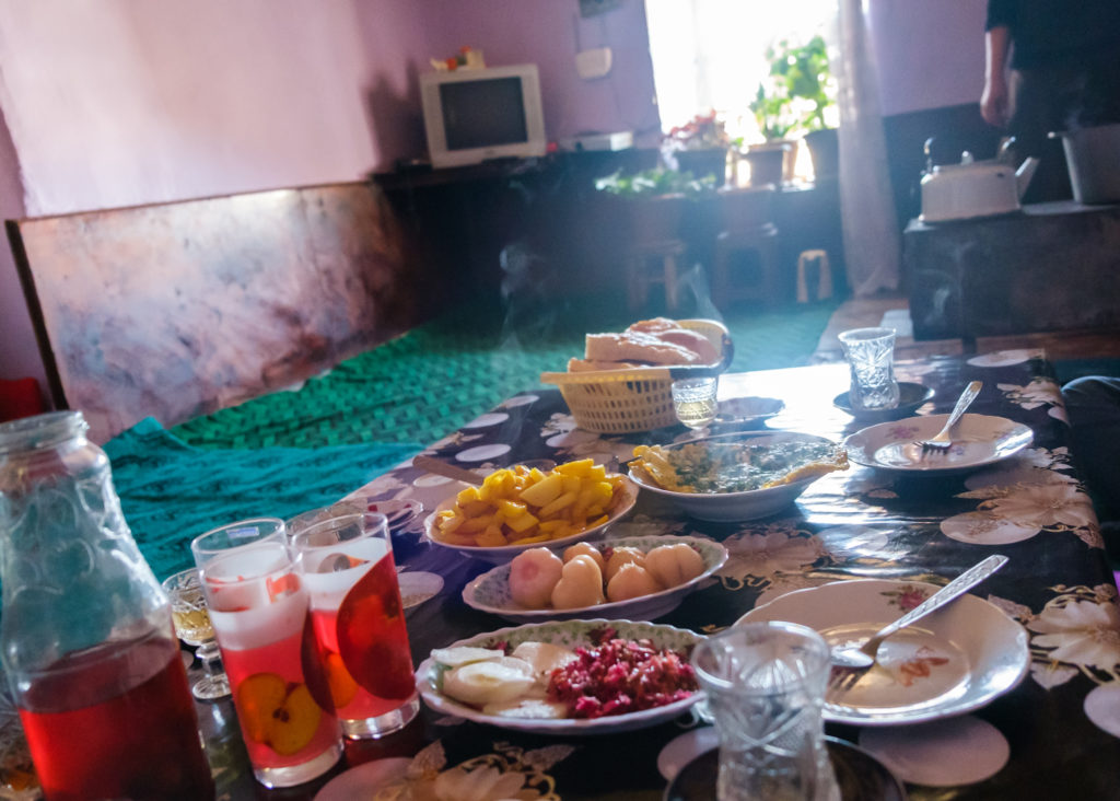 A table topped with plates of food

Description automatically generated